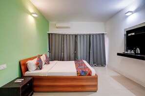 Egyptian cotton sheets, premium bedding, in-room safe, free WiFi - Oriva Shourya Residency (Pune)