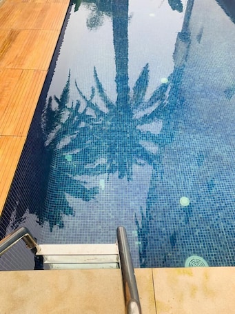 Outdoor pool. Fourteen Hotel Ain Sebaa