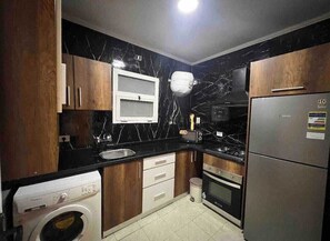 Apartment | Private kitchen | Fridge, microwave, oven, stovetop - Stylish Hotel Apt Madinaty 6.67.17.12 (New Cairo)