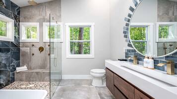 Bathtub, hair dryer, towels