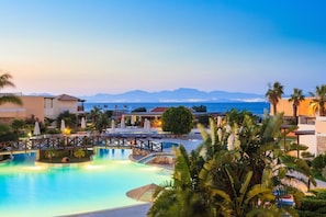 Indoor pool, seasonal outdoor pool, pool umbrellas, sun loungers