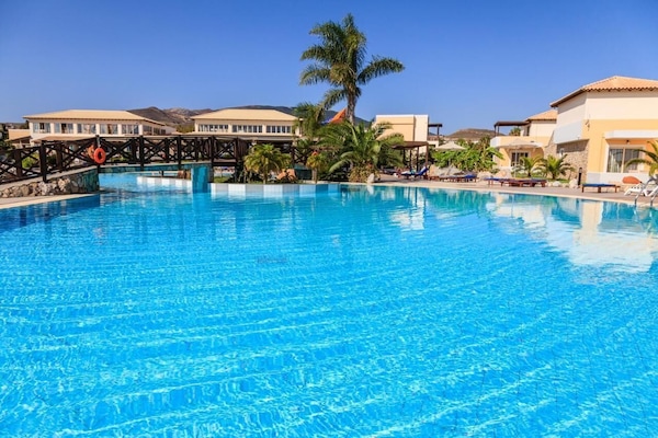 Indoor pool, seasonal outdoor pool, pool umbrellas, sun loungers