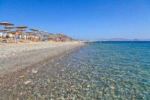 Private beach, sun loungers, beach umbrellas, beach towels