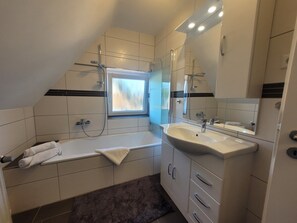 Hair dryer, towels, soap, toilet paper
