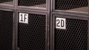 A row of metal lockers with labels 1C, 2A, 1F, and 2D. - House of Lion Hostel and Guesthouse (Langkawi)