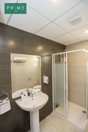 Standaard studio, 2 eenpersoonsbedden | Een kluis op de kamer, een strijkplank/strijkijzer, gratis wifi