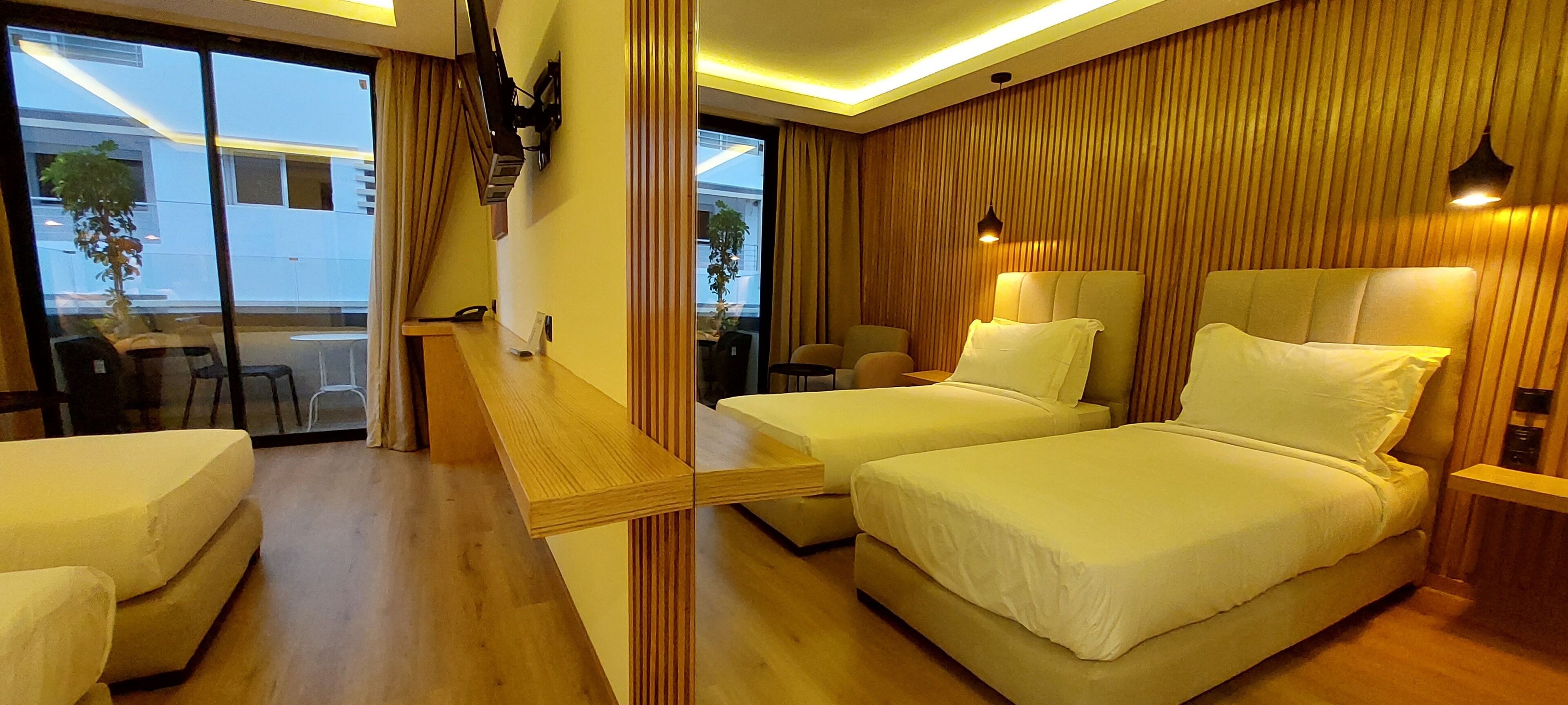 Literie de qualité supérieure, minibar, décoration personnalisée