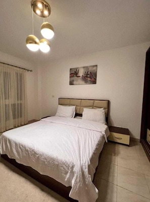Apartamento | 4 dormitorios, tabla de planchar con plancha, wifi gratis