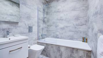 Combined shower/tub, eco-friendly toiletries, hair dryer, towels