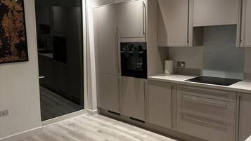 Apartment, 2 Queen Beds | Private kitchen | Fridge, microwave, oven, stovetop