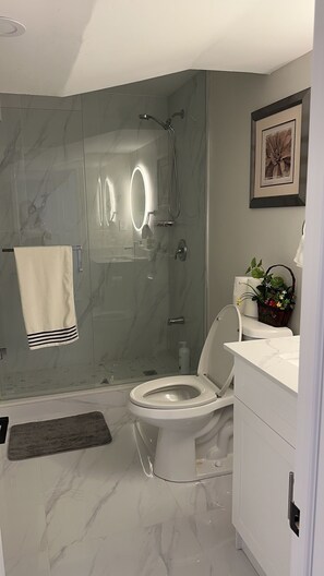 Jetted tub, hair dryer, towels, soap
