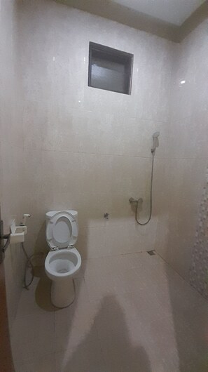 Basic Single Room | Bathroom | Shower, towels, soap - Hotel O Modena Homestay Syariah Near SD Negeri 101798 Deli Tua (Medan)
