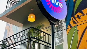 A building with a colorful mural and a sign that reads "Olive." - Olive Zip Calangute Mira by Embassy Group (Calangute)