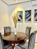 Elite Apartment | Living area | 45-inch LED TV with cable channels, Netflix, Hulu