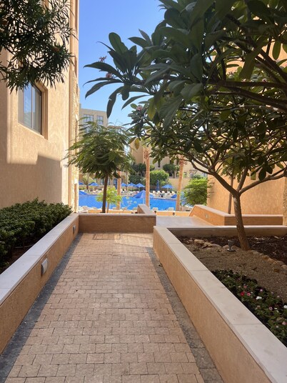 Apartment 2BR at Samarah resort- Dead Sea . Ground floor, beach access .