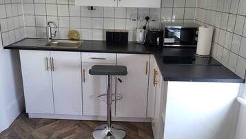 Apartment | Private kitchen | Fridge, microwave, stovetop, electric kettle