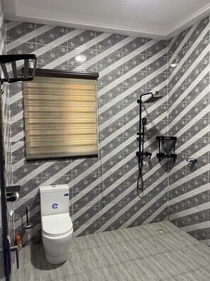 Shower, eco-friendly toiletries, towels, soap