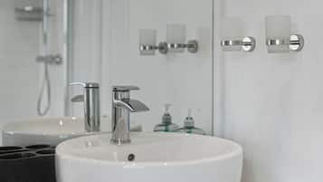 Bathtub, hair dryer, towels