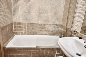 Bathtub, hair dryer