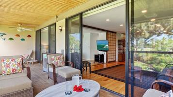 Condo, 2 Queen Beds, Balcony, Partial Ocean View (Grace's Oasis) | Living area | 50-inch flat-screen TV with digital channels