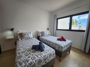 3 bedrooms, iron/ironing board, travel cot, WiFi