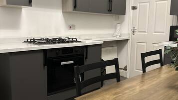 Apartment | Private kitchen | Fridge, microwave, oven, stovetop