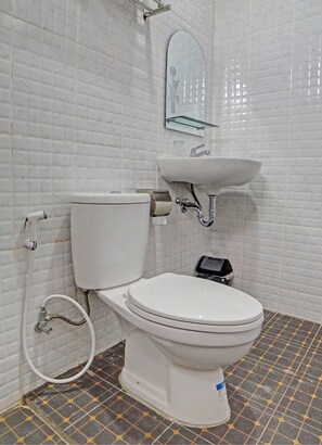 Habitación ejecutiva doble | Baño | Ducha y toallas