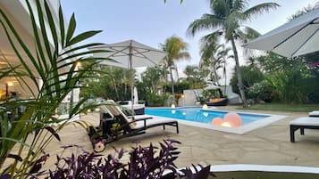 Outdoor pool, pool umbrellas, pool loungers