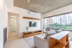 Superior Apartment | Living area | 32-inch Smart TV with digital channels
