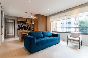 Executive Apartment | Living area | 32-inch Smart TV with digital channels