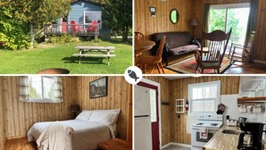 A cabin with a deck, a cozy living room, a bedroom, and a kitchen. - Staying by the Lakeside Cottages (Plummer Additional)