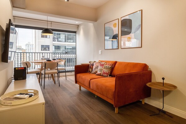 Apartment | Living area | 42-inch Smart TV with cable channels