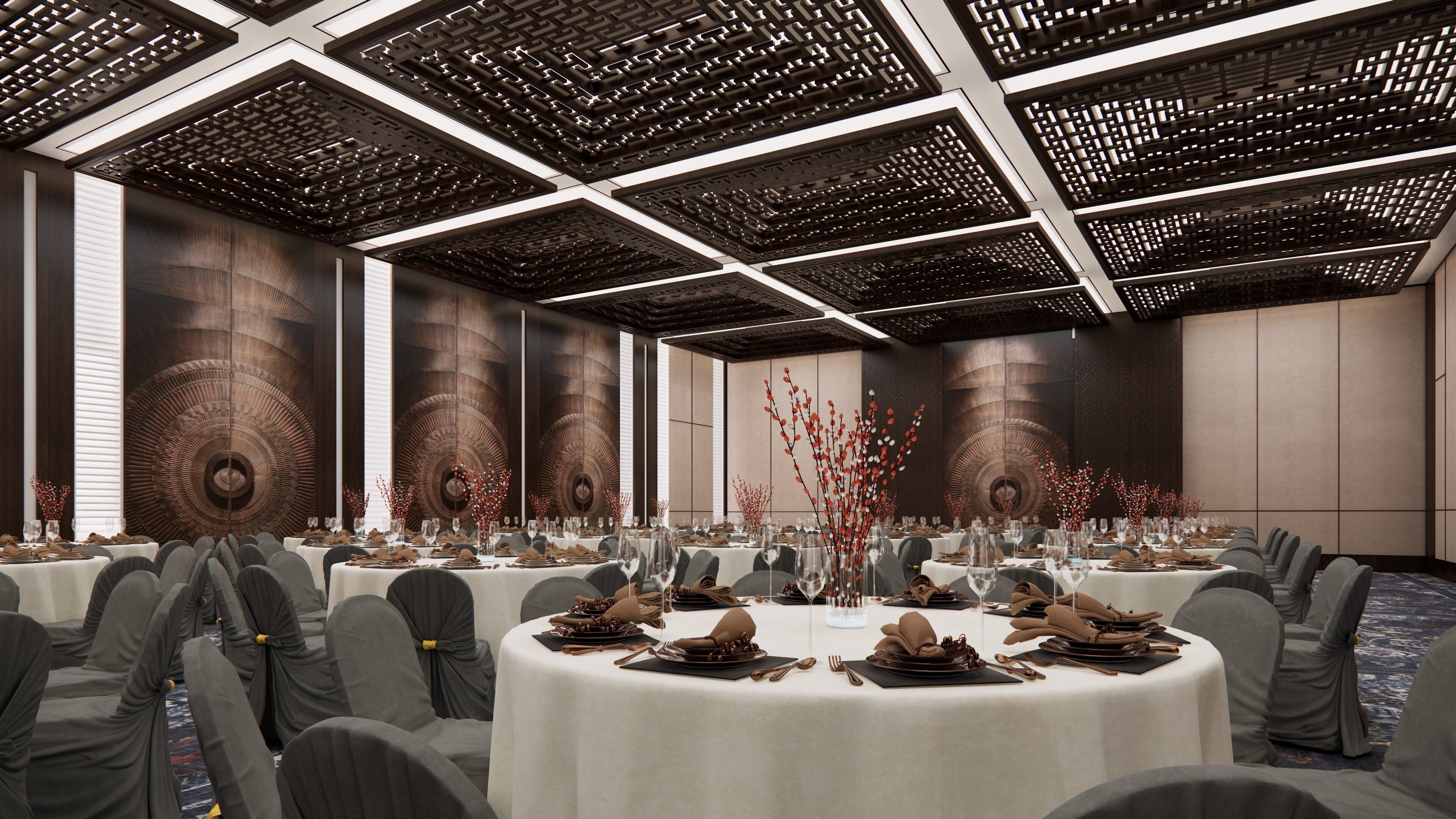 A conference room with round tables, grey chairs, and a modern ceiling design.