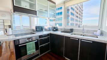 Apartment | Private kitchen | Fridge, microwave, toaster, cookware/dishes/utensils