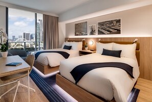 2 bedrooms, hypo-allergenic bedding, down duvets, minibar