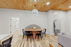 Dining - Stunning dog-friendly cottage with riverfront patio, hot tub, fire pit, & views (Boone)
