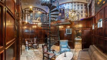 Galileo's Gate | Living area | 45-inch flat-screen TV with cable channels, Netflix, DVD player