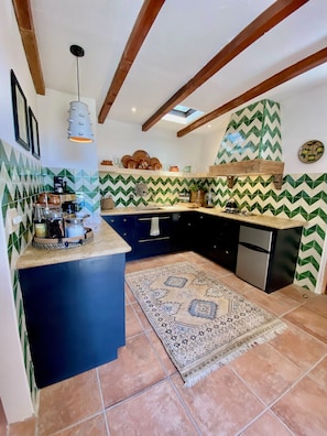 Fridge, microwave, stovetop, coffee/tea maker