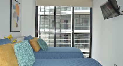 Cozy Stays Cayala Apartments with AC near US Embassy