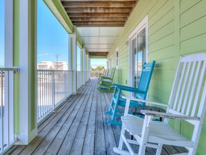 Terrace/patio - Sea Urchins, North & South Units. 10 BR 10BA. Beachview. The Beach, so close, for less! Pool. (Gulf Shores)