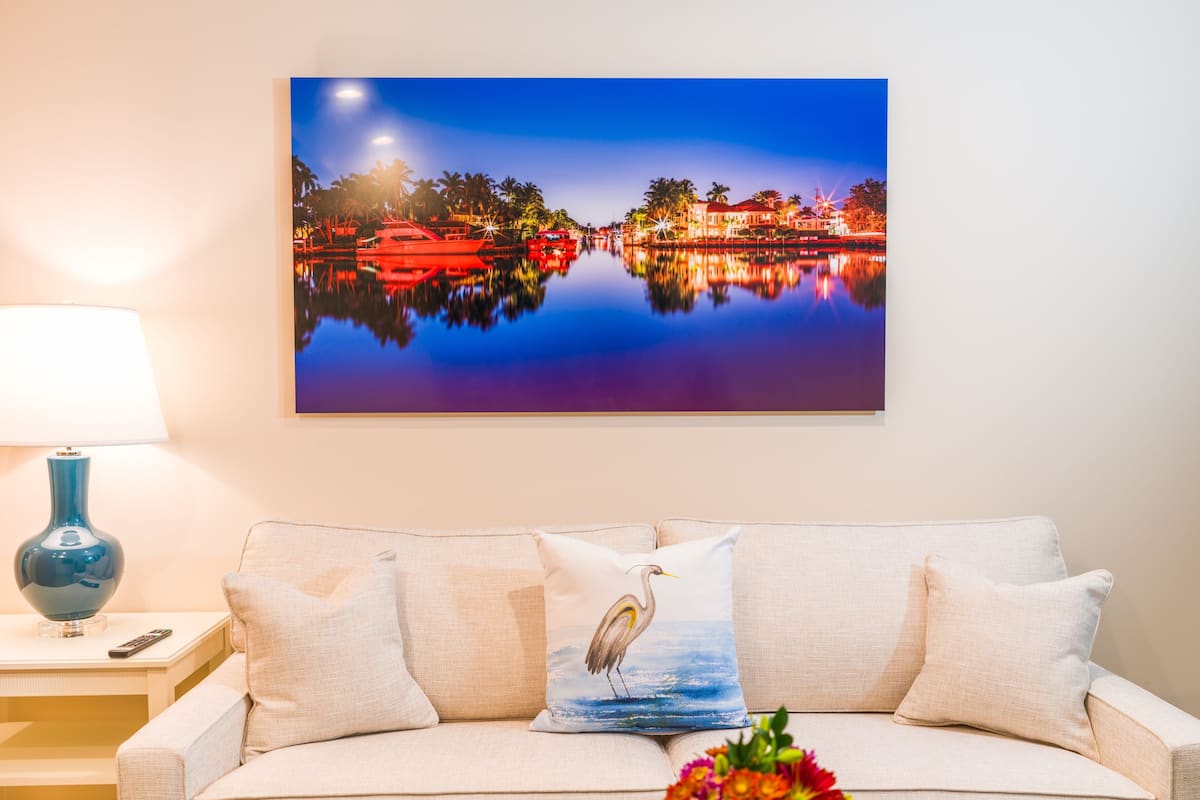 Room 502 - One bedroom suite | Living room | 65-inch flat-screen TV with digital channels
