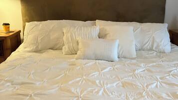 2 chambres, coffres-forts dans les chambres, fer et planche Ă repasser