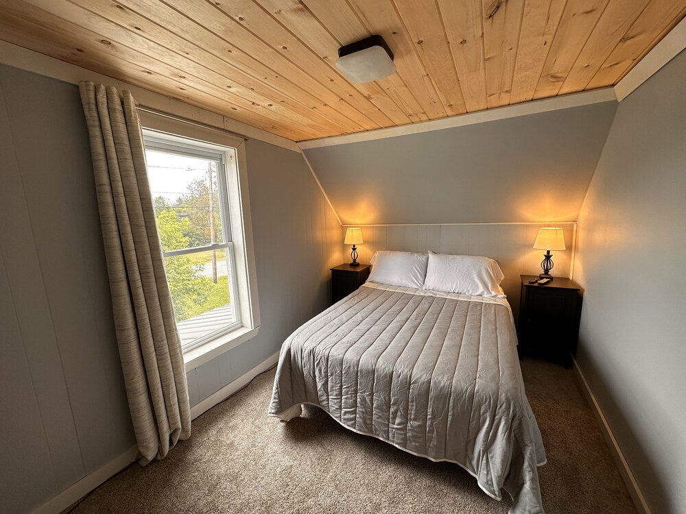 Charming New England Cape just feet from Snowmobile and ATV Trails