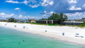 On the beach, sun-loungers, beach towels