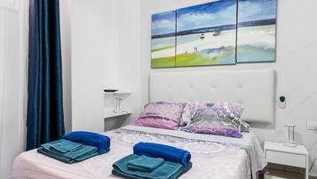 2 habitaciones, tabla de planchar con plancha, wifi y ropa de cama