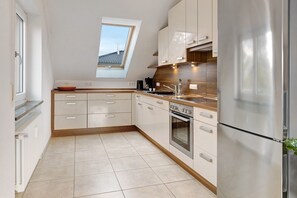 Refrigerador, horno, parrilla de estufa y lavavajillas 