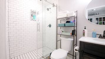 Shower, hair dryer, towels, soap