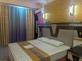 Premium bedding, down duvets, memory-foam beds, desk