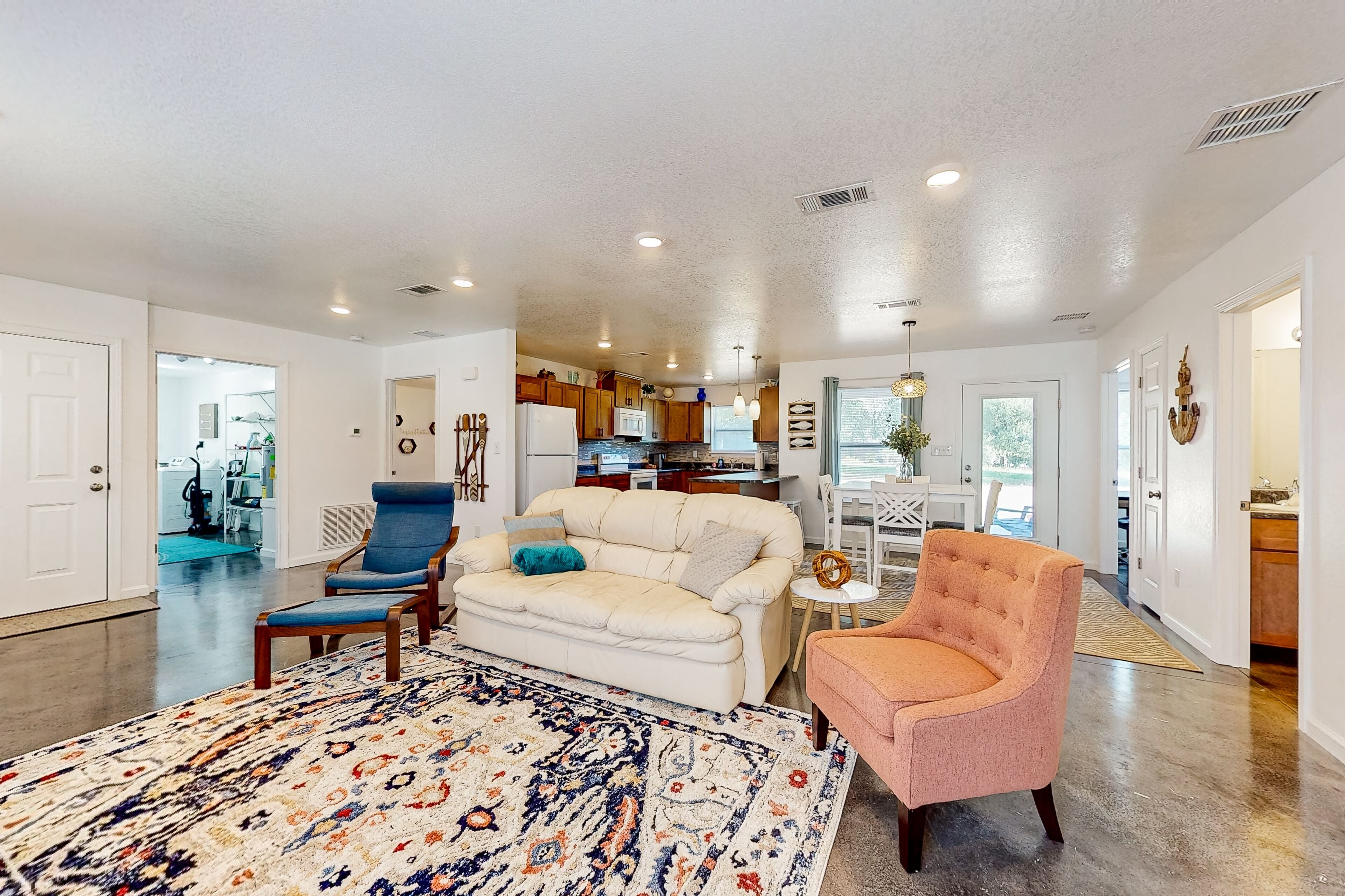 Sunny and updated home with workspace, beach gear, games, and firepit