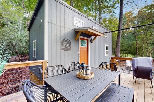 Lakeview tiny home with a loft, full kitchen, furnished deck, & firepit